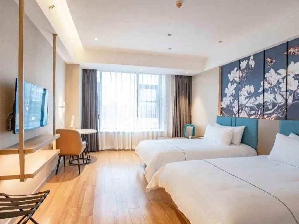 Bed in Magnotel Hotel Guangyuan Nanhe Bus Station Beijing Road