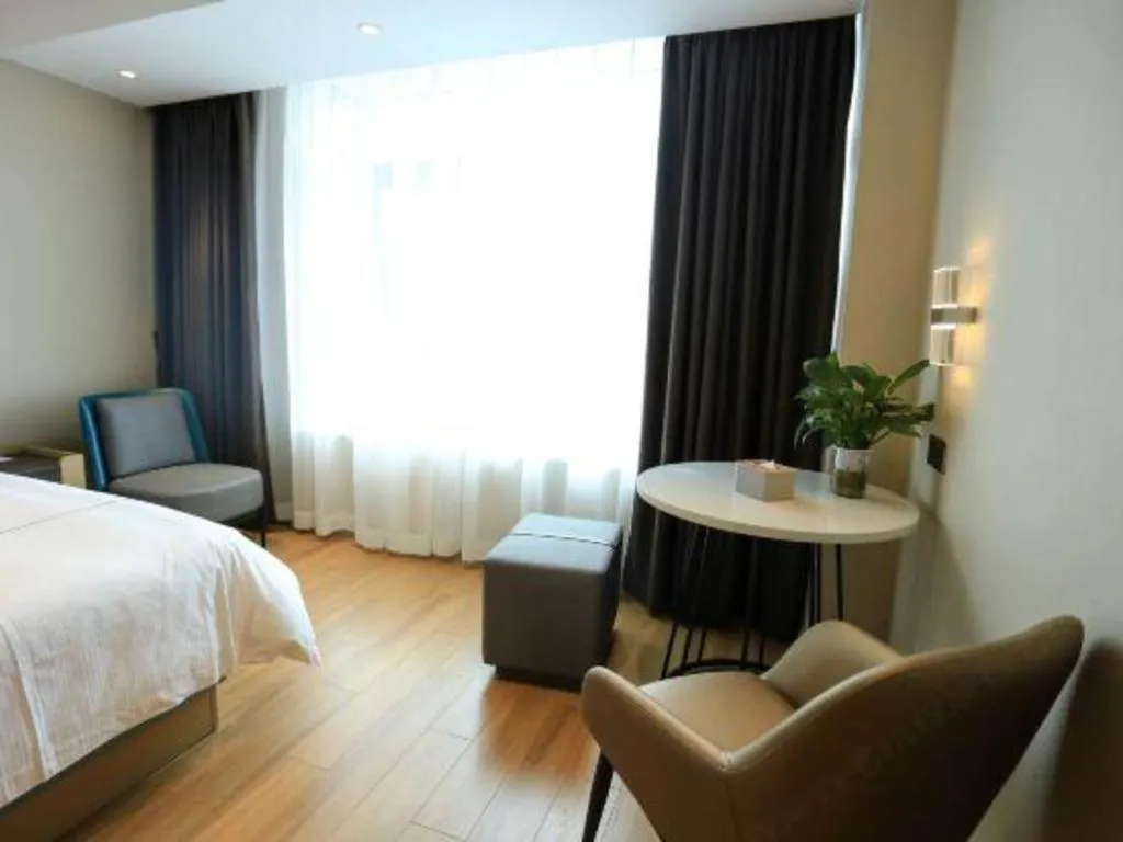 Bed in Magnotel Hotel Guangyuan Nanhe Bus Station Beijing Road