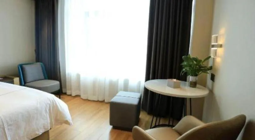 Bed in Magnotel Hotel Guangyuan Nanhe Bus Station Beijing Road