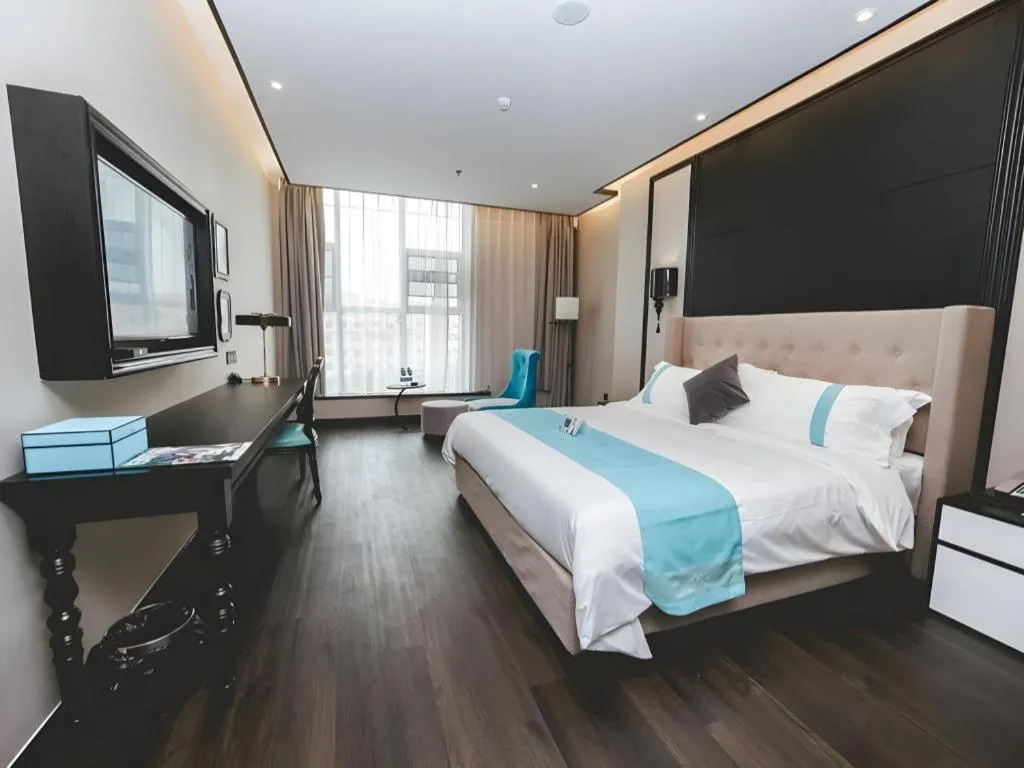 Bed in Xana Hotelle Binzhou Yangxin