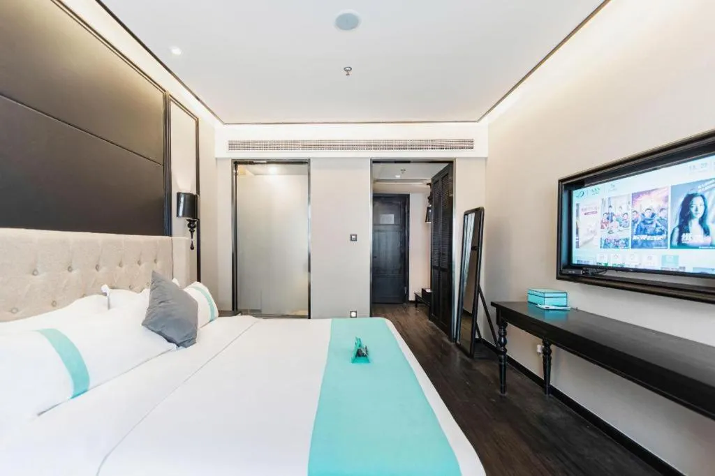 Bed in Xana Hotelle Binzhou Yangxin