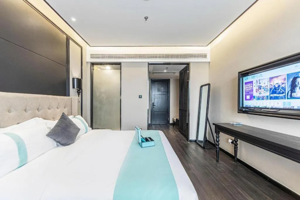 Bed in Xana Hotelle Binzhou Yangxin