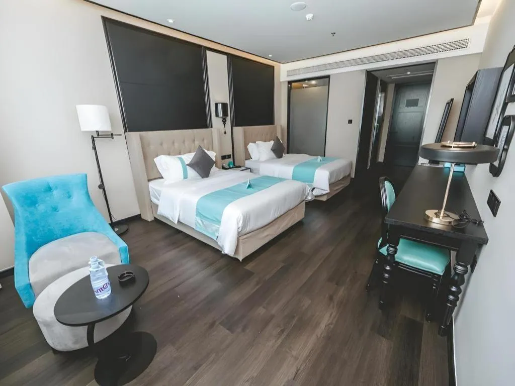 Bed in Xana Hotelle Binzhou Yangxin