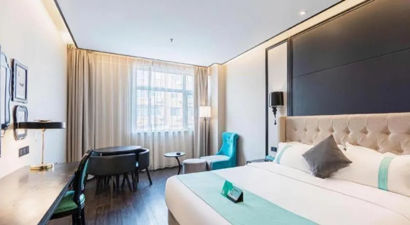 Bed in Xana Hotelle Binzhou Yangxin