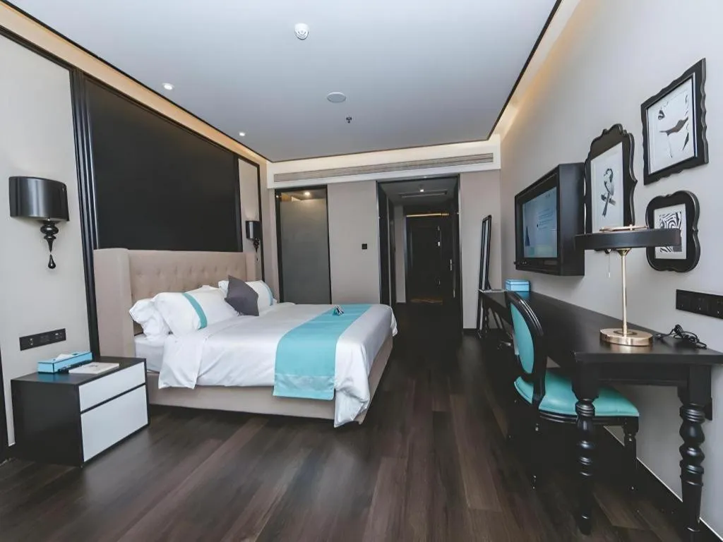 Bed in Xana Hotelle Binzhou Yangxin