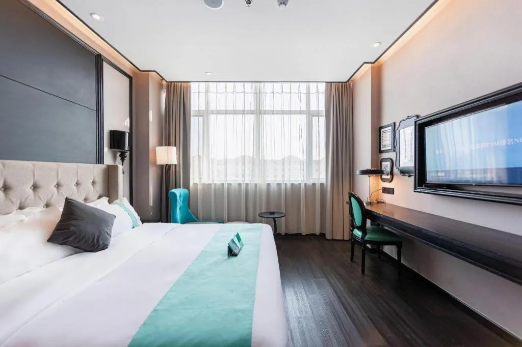 Bed in Xana Hotelle Binzhou Yangxin