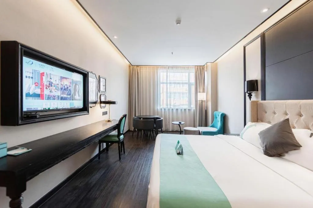 Bed in Xana Hotelle Binzhou Yangxin