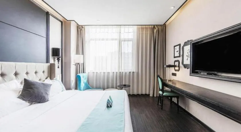 Bed in Xana Hotelle Binzhou Yangxin