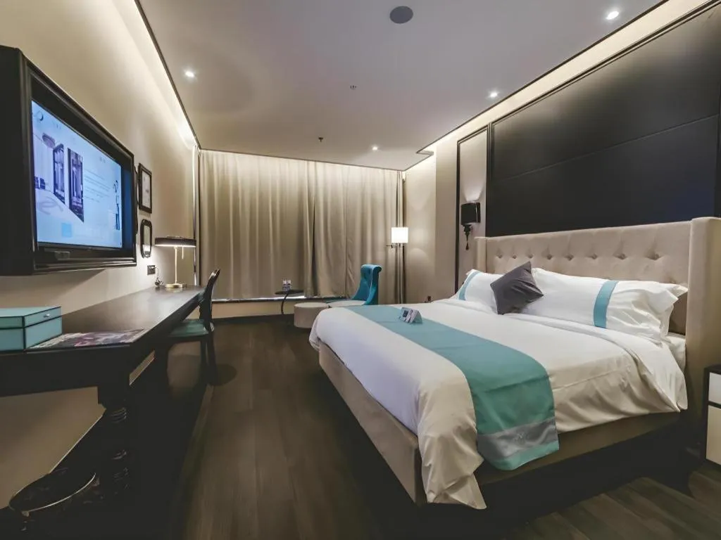 Bed in Xana Hotelle Binzhou Yangxin