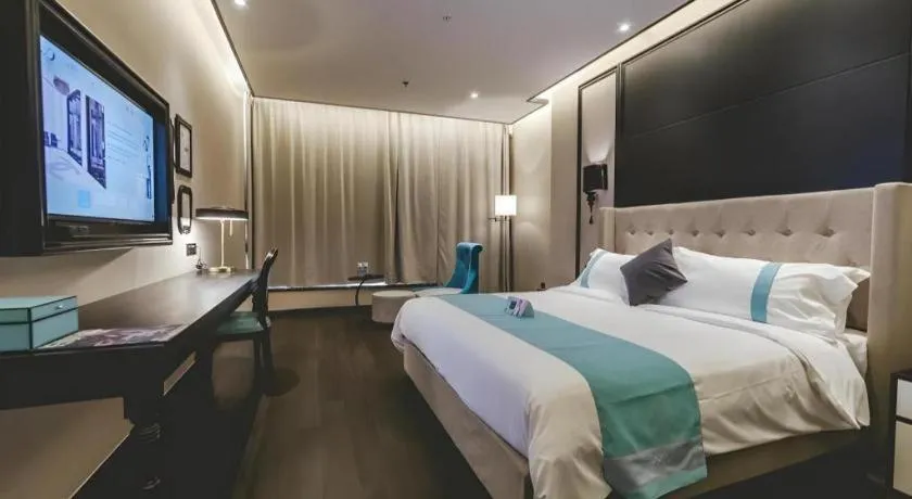 Bed in Xana Hotelle Binzhou Yangxin