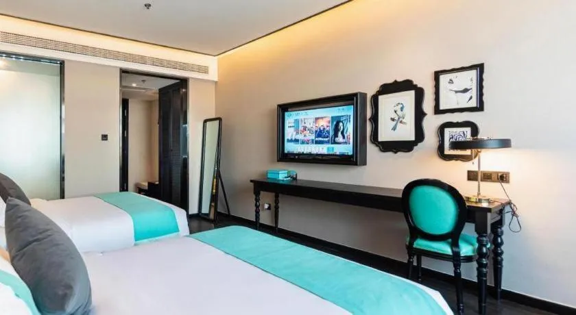 Bed in Xana Hotelle Binzhou Yangxin