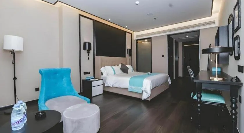 Bed in Xana Hotelle Binzhou Yangxin