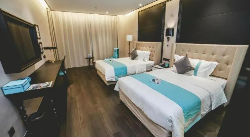 Bed in Xana Hotelle Binzhou Yangxin