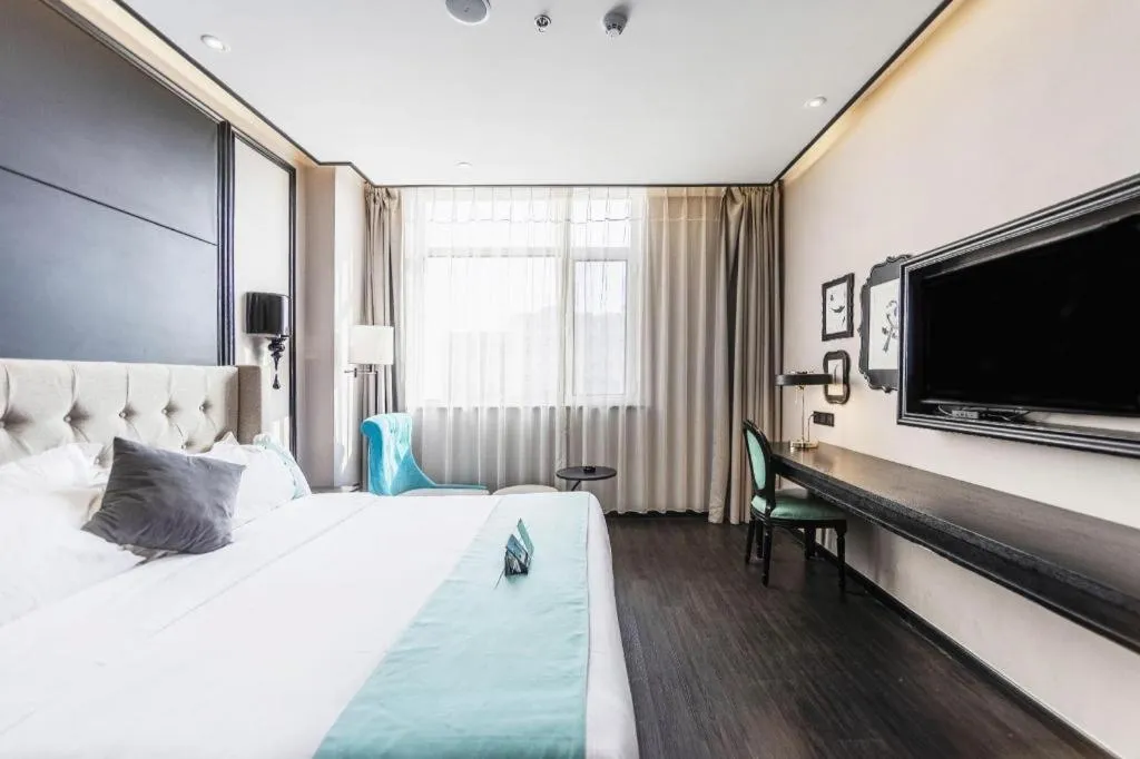 Bed in Xana Hotelle Binzhou Yangxin