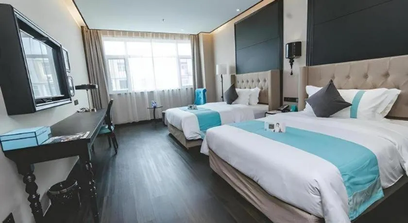 Bed in Xana Hotelle Binzhou Yangxin