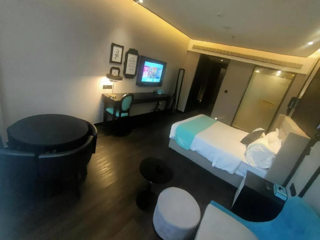 Bed in Xana Hotelle Binzhou Yangxin