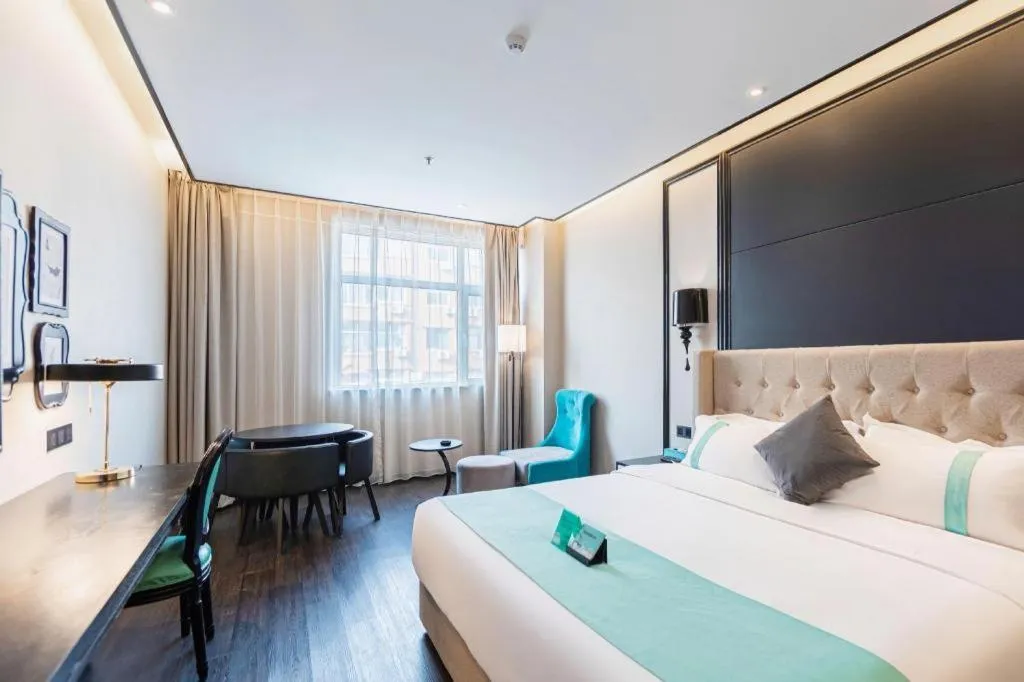 Bed in Xana Hotelle Binzhou Yangxin