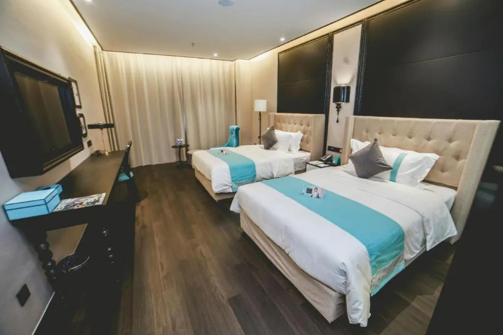 Bed in Xana Hotelle Binzhou Yangxin