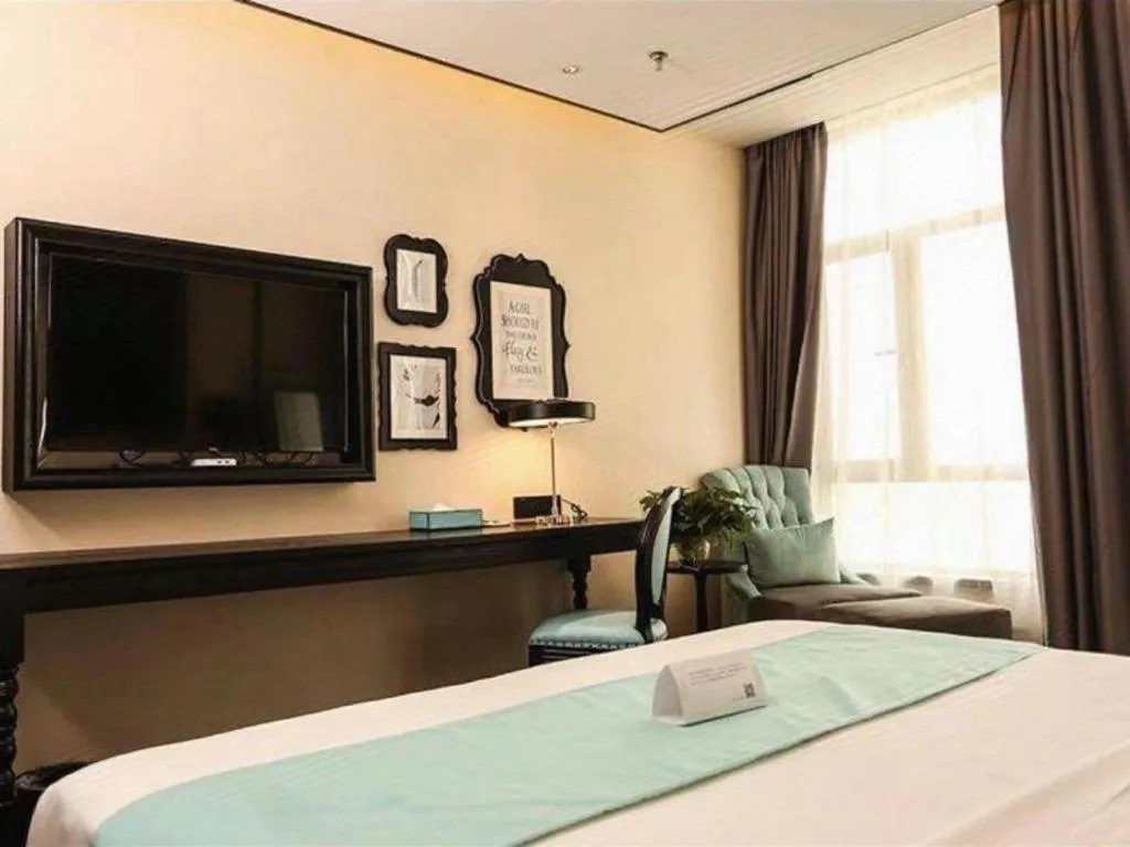 Bed in Xana Hotelle Binzhou Yangxin