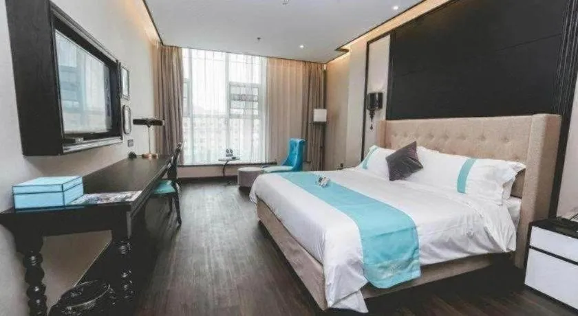 Bed in Xana Hotelle Binzhou Yangxin