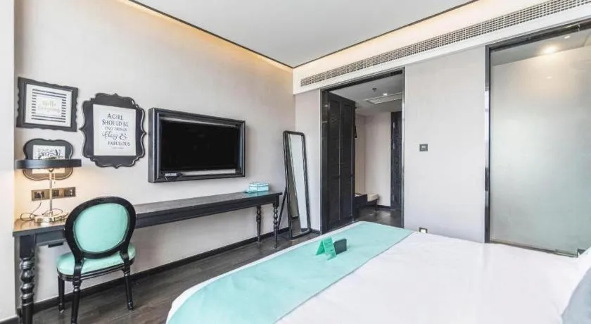 Bed in Xana Hotelle Binzhou Yangxin