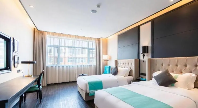 Bed in Xana Hotelle Binzhou Yangxin