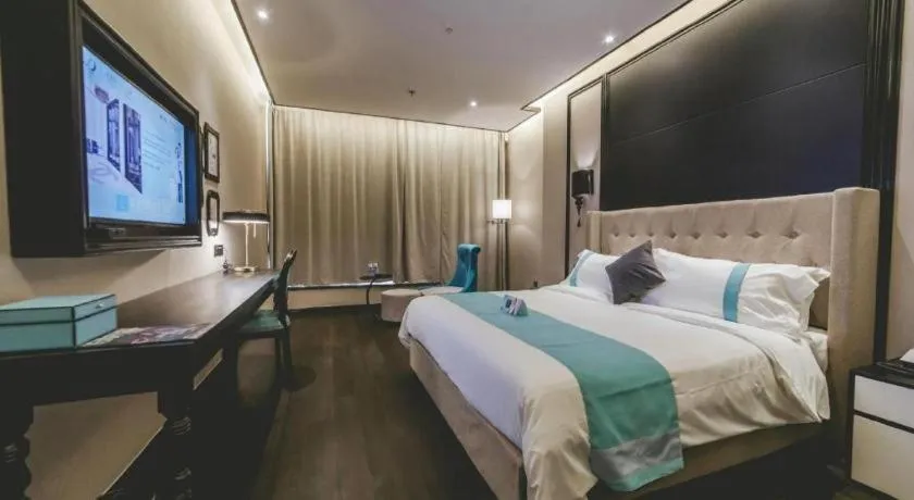 Bed in Xana Hotelle Binzhou Yangxin