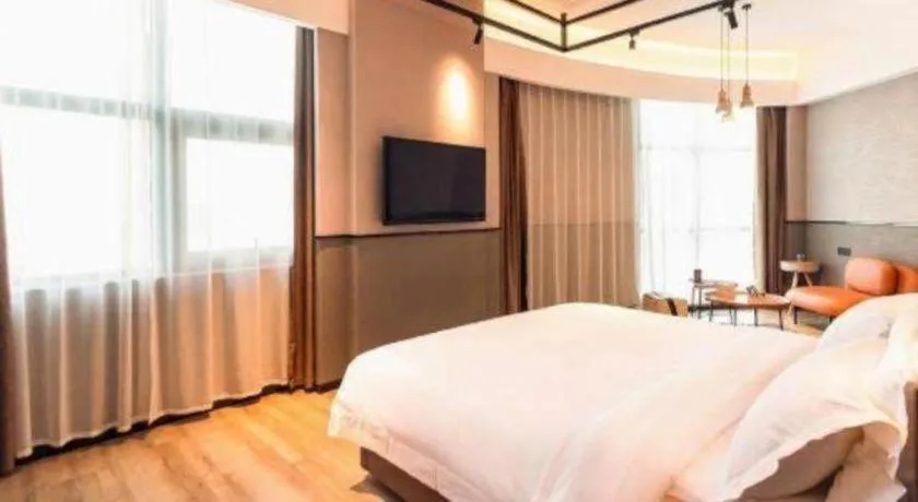 Bed in ZMAX Hotel Yan'an Baimi Avenue Baotashan