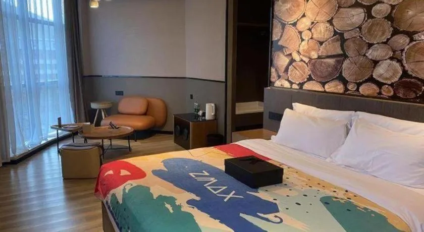 Bed in ZMAX Hotel Yan'an Baimi Avenue Baotashan