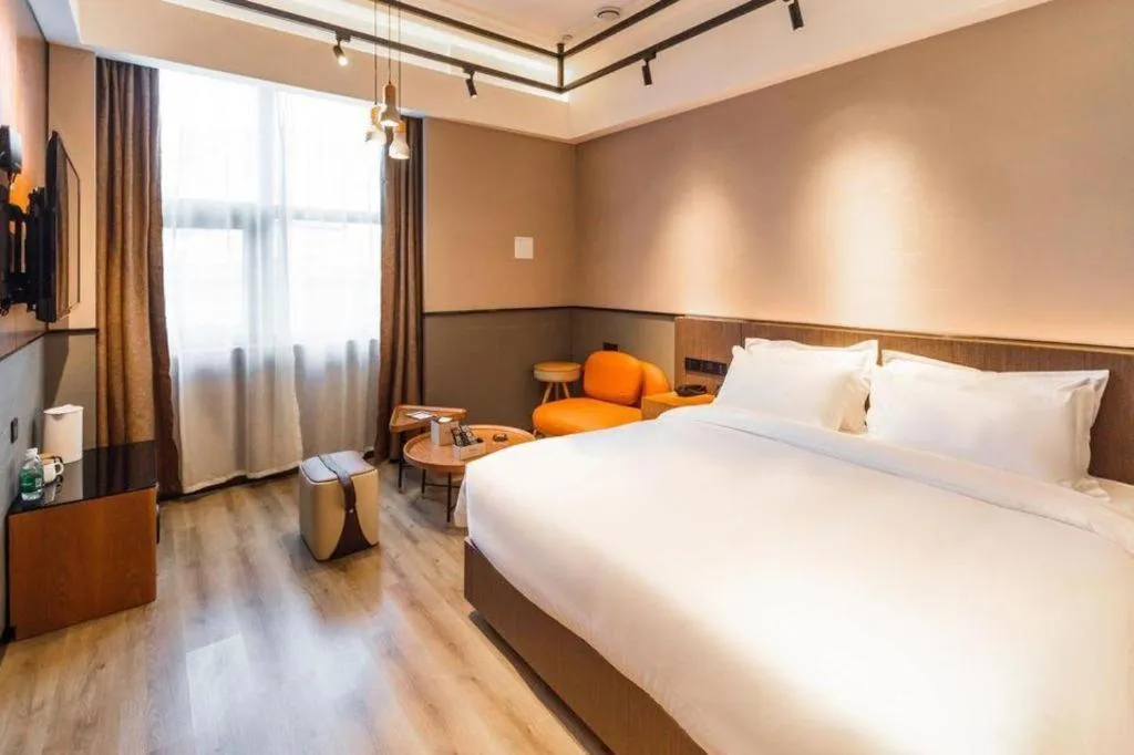 Bed in ZMAX Hotel Yan'an Baimi Avenue Baotashan