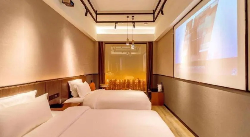 Bed in ZMAX Hotel Yan'an Baimi Avenue Baotashan