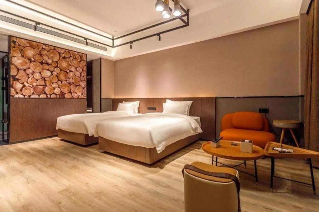 Bed in ZMAX Hotel Yan'an Baimi Avenue Baotashan