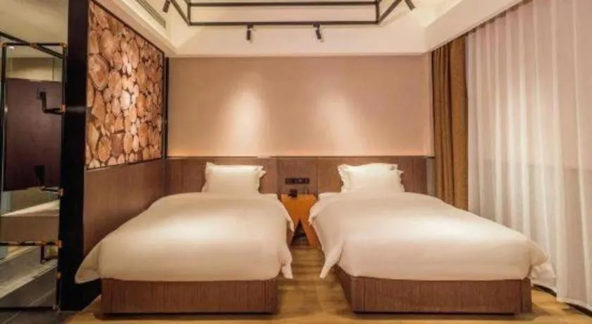 Bed in ZMAX Hotel Yan'an Baimi Avenue Baotashan