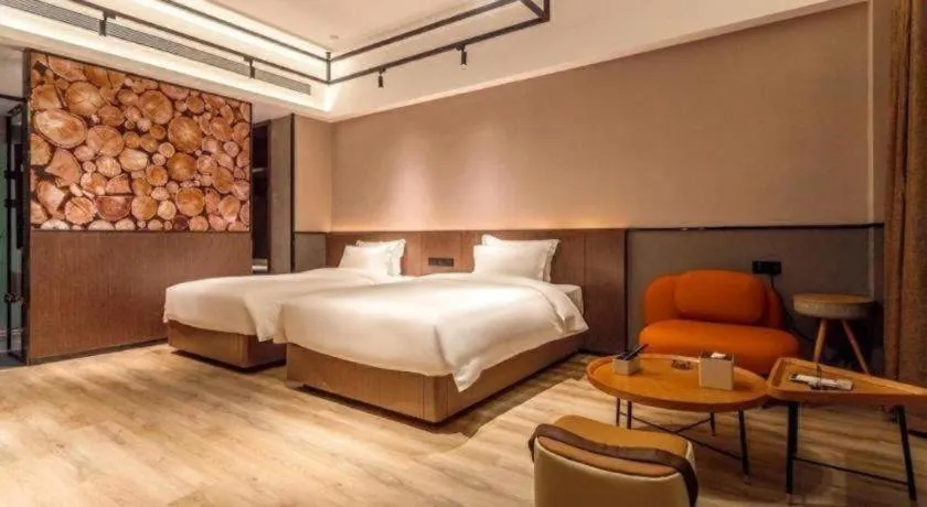 Bed in ZMAX Hotel Yan'an Baimi Avenue Baotashan