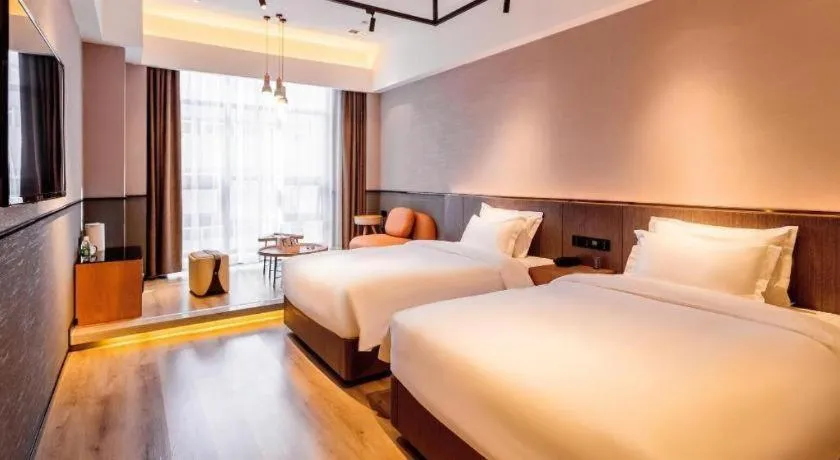 Bed in ZMAX Hotel Yan'an Baimi Avenue Baotashan