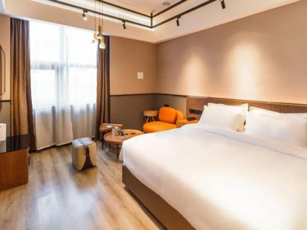 Bed in ZMAX Hotel Yan'an Baimi Avenue Baotashan