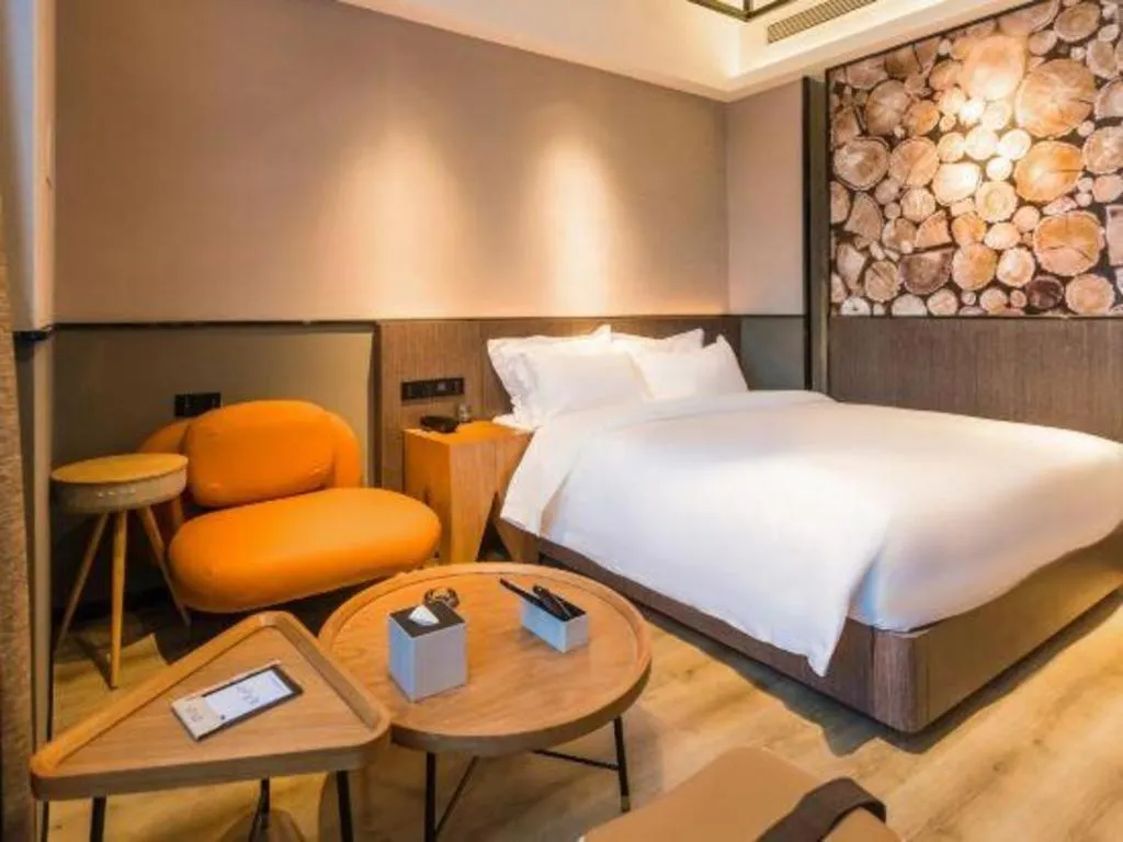 Bed in ZMAX Hotel Yan'an Baimi Avenue Baotashan