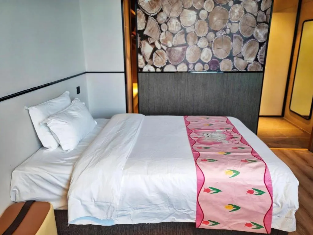 Bed in ZMAX Hotel Yan'an Baimi Avenue Baotashan