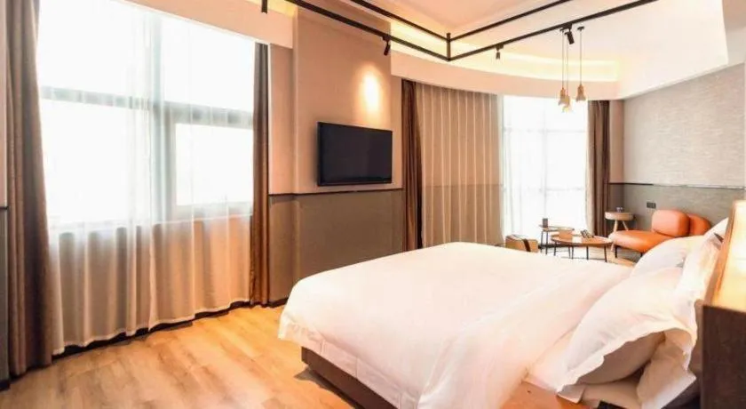 Bed in ZMAX Hotel Yan'an Baimi Avenue Baotashan