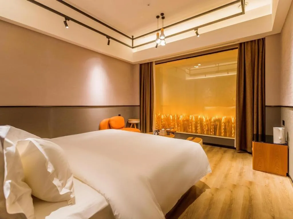 Bed in ZMAX Hotel Yan'an Baimi Avenue Baotashan