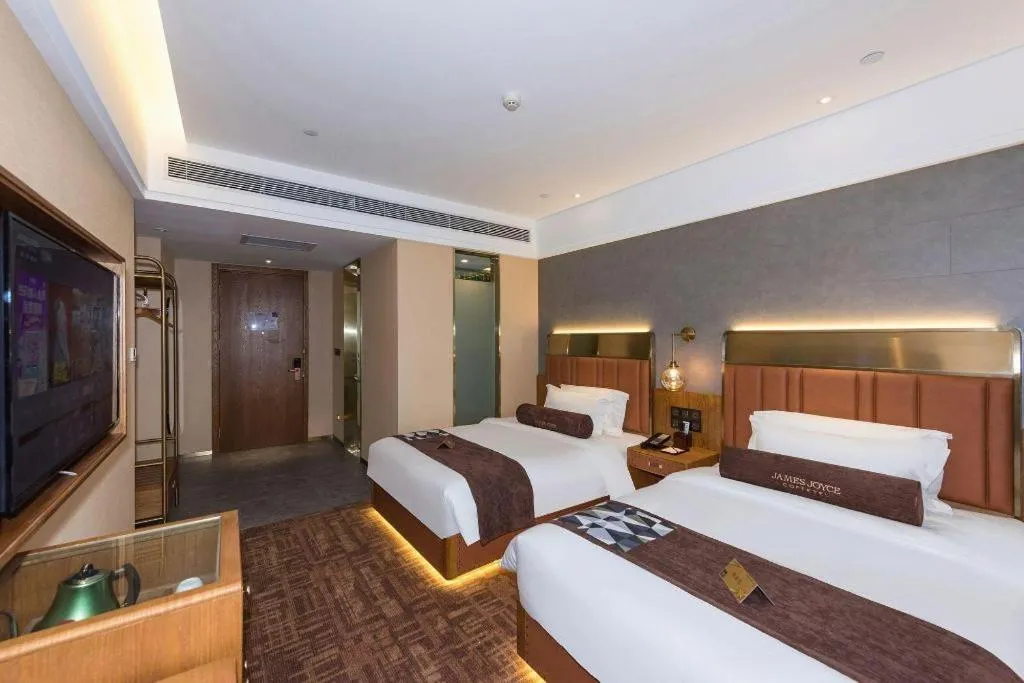 Bed in James Joyce Coffetel Tianjing First Central Hospital Nankai University