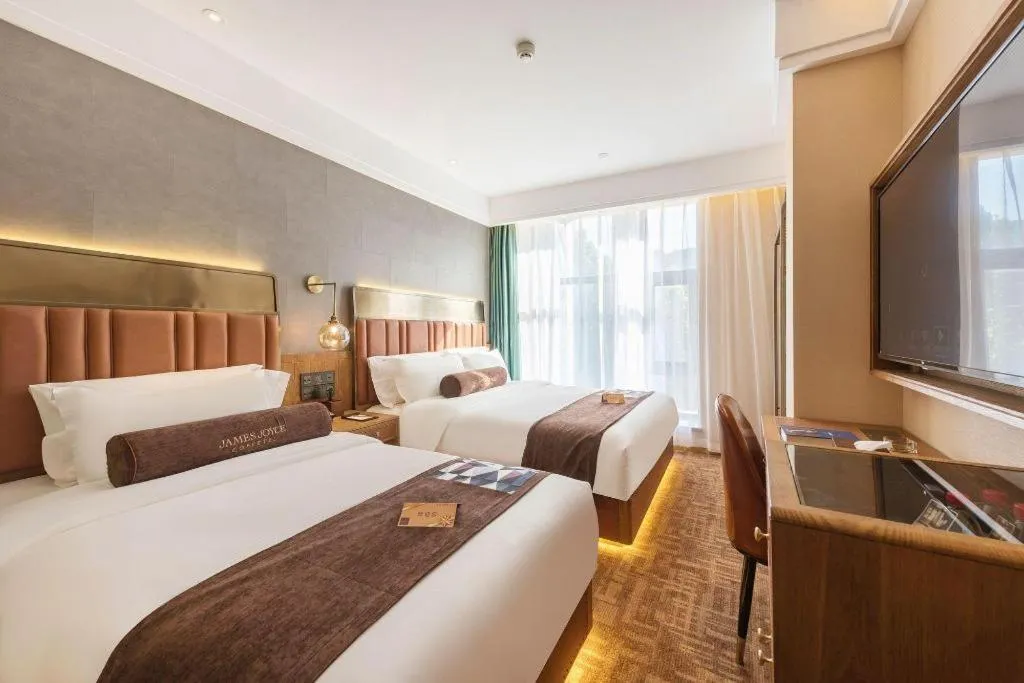 Bed in James Joyce Coffetel Tianjing First Central Hospital Nankai University