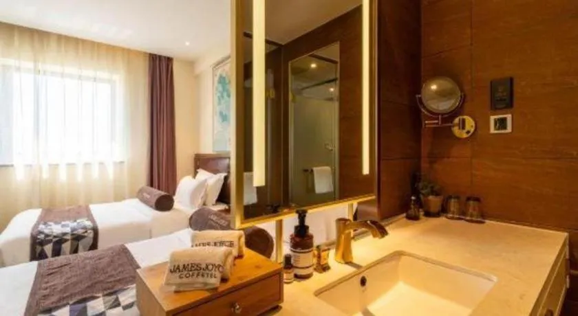 Bed in James Joyce Coffetel Beijing Yizhuang Development Zone Chicheng Times Square