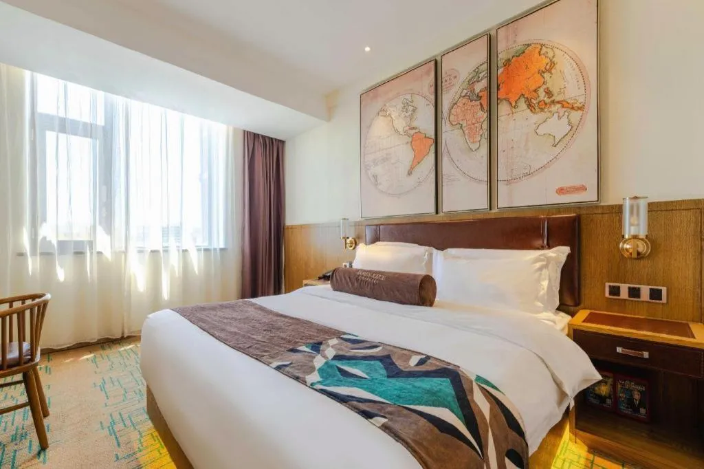 Bed in James Joyce Coffetel Beijing Yizhuang Development Zone Chicheng Times Square