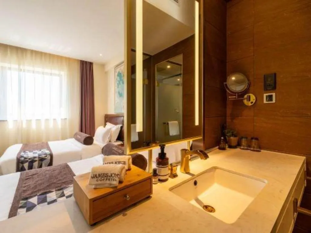 Bed in James Joyce Coffetel Beijing Yizhuang Development Zone Chicheng Times Square