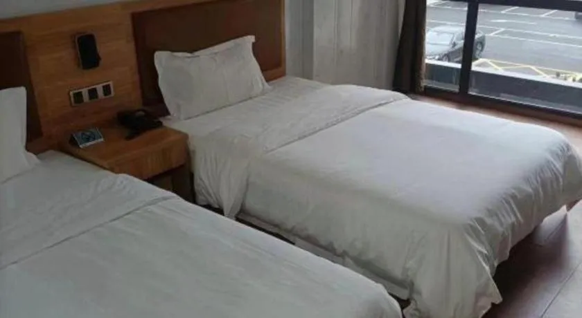 Bed in James Joyce Coffetel Beijing Yizhuang Development Zone Chicheng Times Square