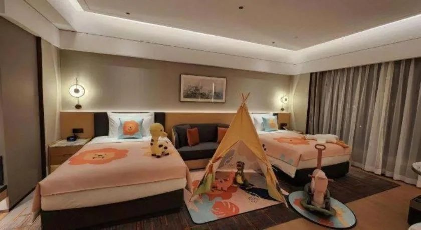 Bed in James Joyce Coffetel Beijing Yizhuang Development Zone Chicheng Times Square