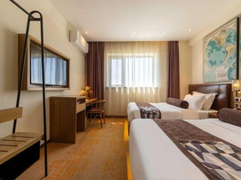 Bed in James Joyce Coffetel Beijing Yizhuang Development Zone Chicheng Times Square