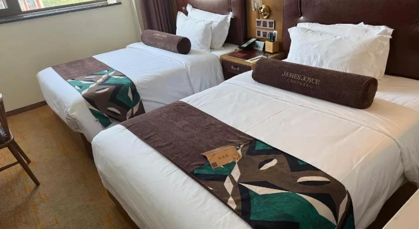 Bed in James Joyce Coffetel Beijing Yizhuang Development Zone Chicheng Times Square