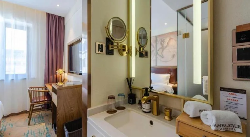 Bed in James Joyce Coffetel Beijing Yizhuang Development Zone Chicheng Times Square